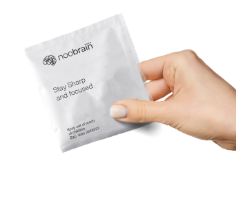 Hand image holding the sleepie capsule packs